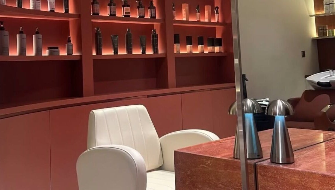 Luxurious salon chair and product display at Beyond Beauty, Ajman, Ajman, AE.