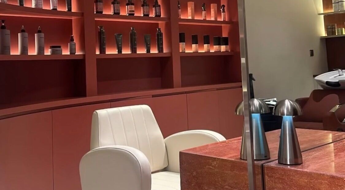 Luxurious salon chair and product display at Beyond Beauty, Ajman, Ajman, AE.
