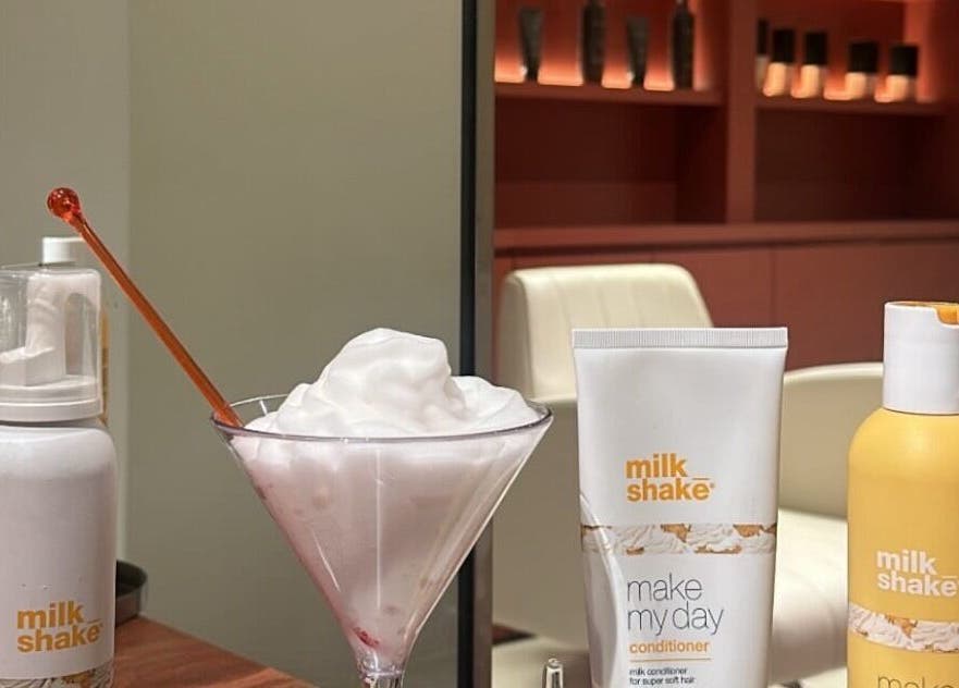Milkshake treatment products displayed elegantly at Beyond Beauty, Ajman, Ajman, AE.
