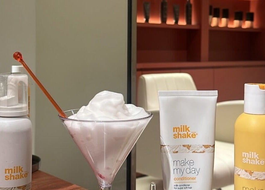 Milkshake treatment products displayed elegantly at Beyond Beauty, Ajman, Ajman, AE.
