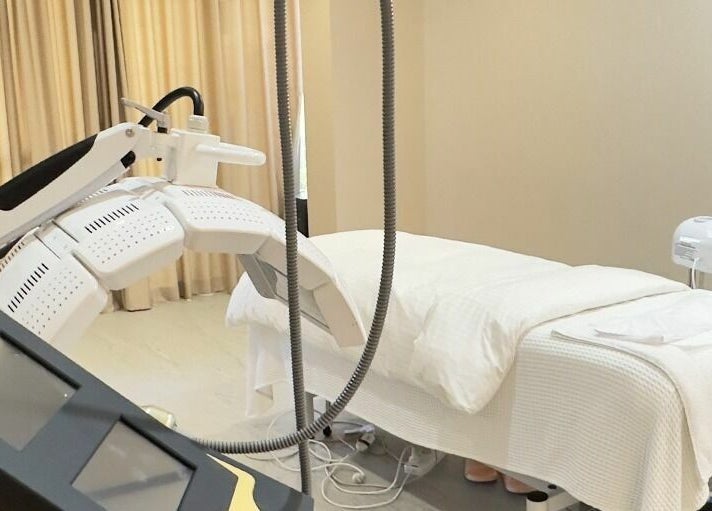 Modern treatment room at Reyoung Skin Clinic in Epping, New South Wales, AU featuring advanced skincare equipment.
