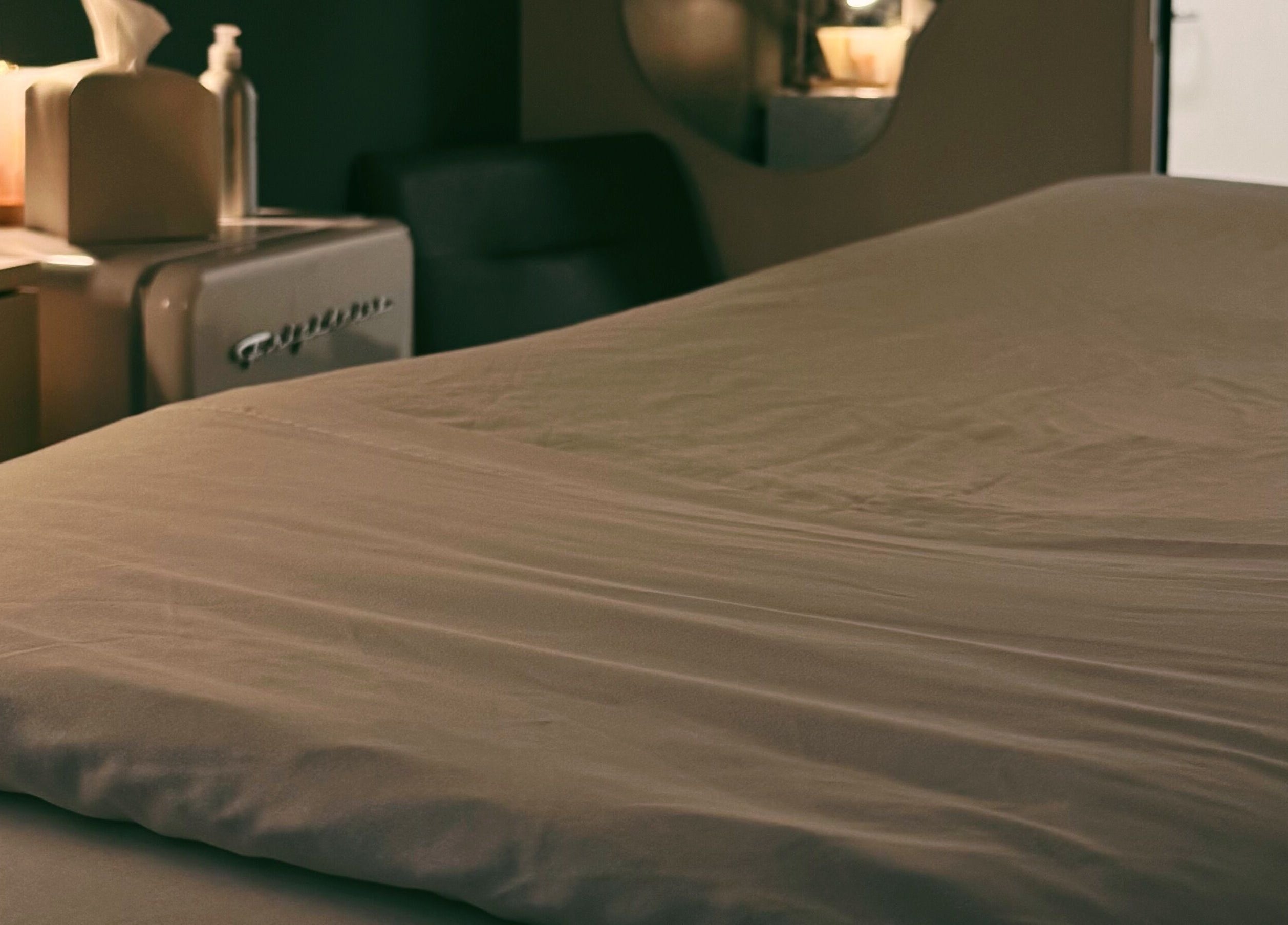 Cozy treatment room at Lyla Skin Studio, Aliso Viejo, California, US, ready for a relaxing session.