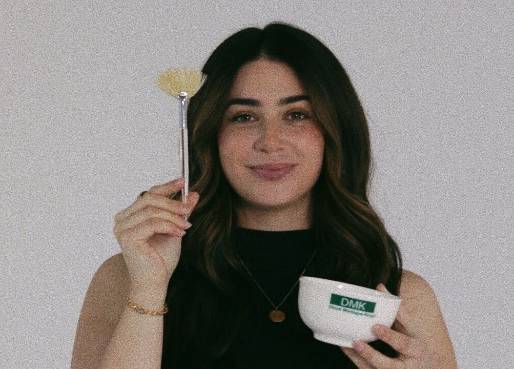 Beauty expert at Lyla Skin Studio, Aliso Viejo, California, US, holding a treatment brush and bowl.