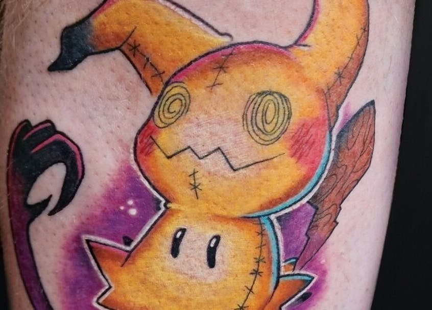 Colorful character tattoo at Lucky Bird Tattoo Studio, Somerton, England, GB, showcasing vibrant artistry.