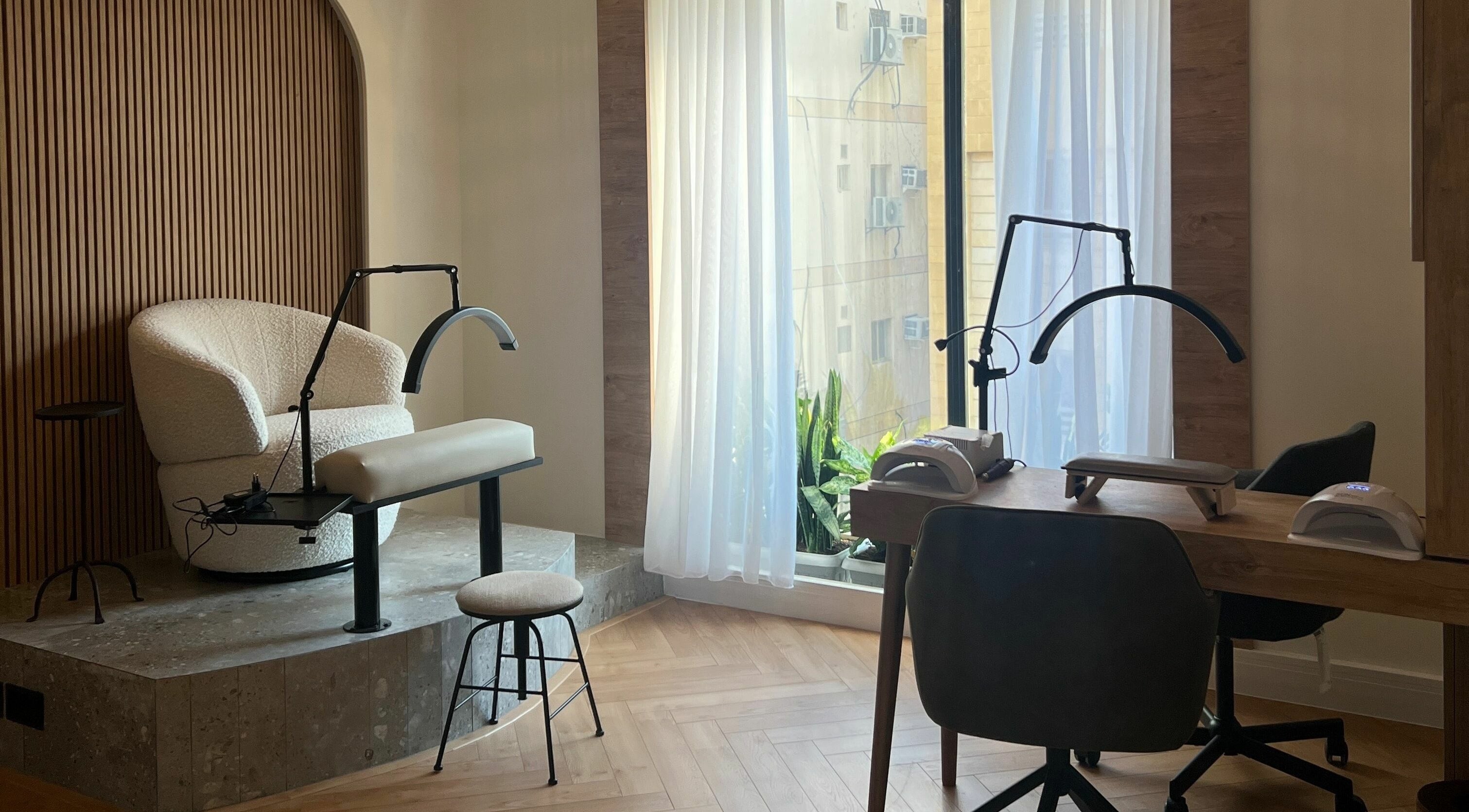 Elegant spa room at Posh Beauty Brand, Jeddah, Makkah Province, SA with modern manicure stations.