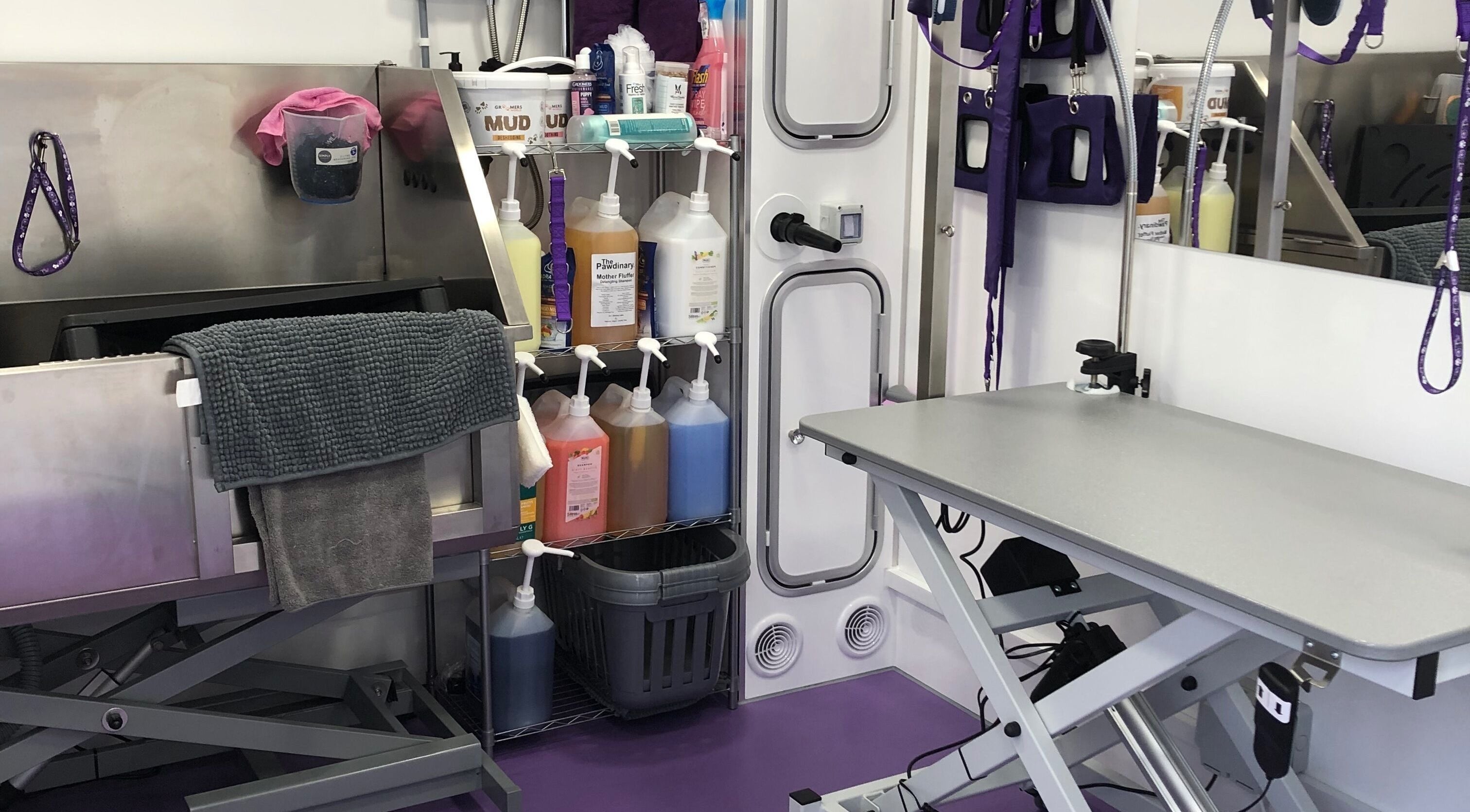 Modern grooming station at Bella’s Beauty Groom, Southampton, England, GB, showcasing tools and equipment.