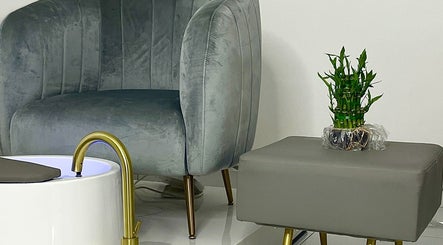 Modern spa chair with bamboo plant at Beauty Box Ladies Salon, Dubai, Dubai, AE, offering serene relaxation.