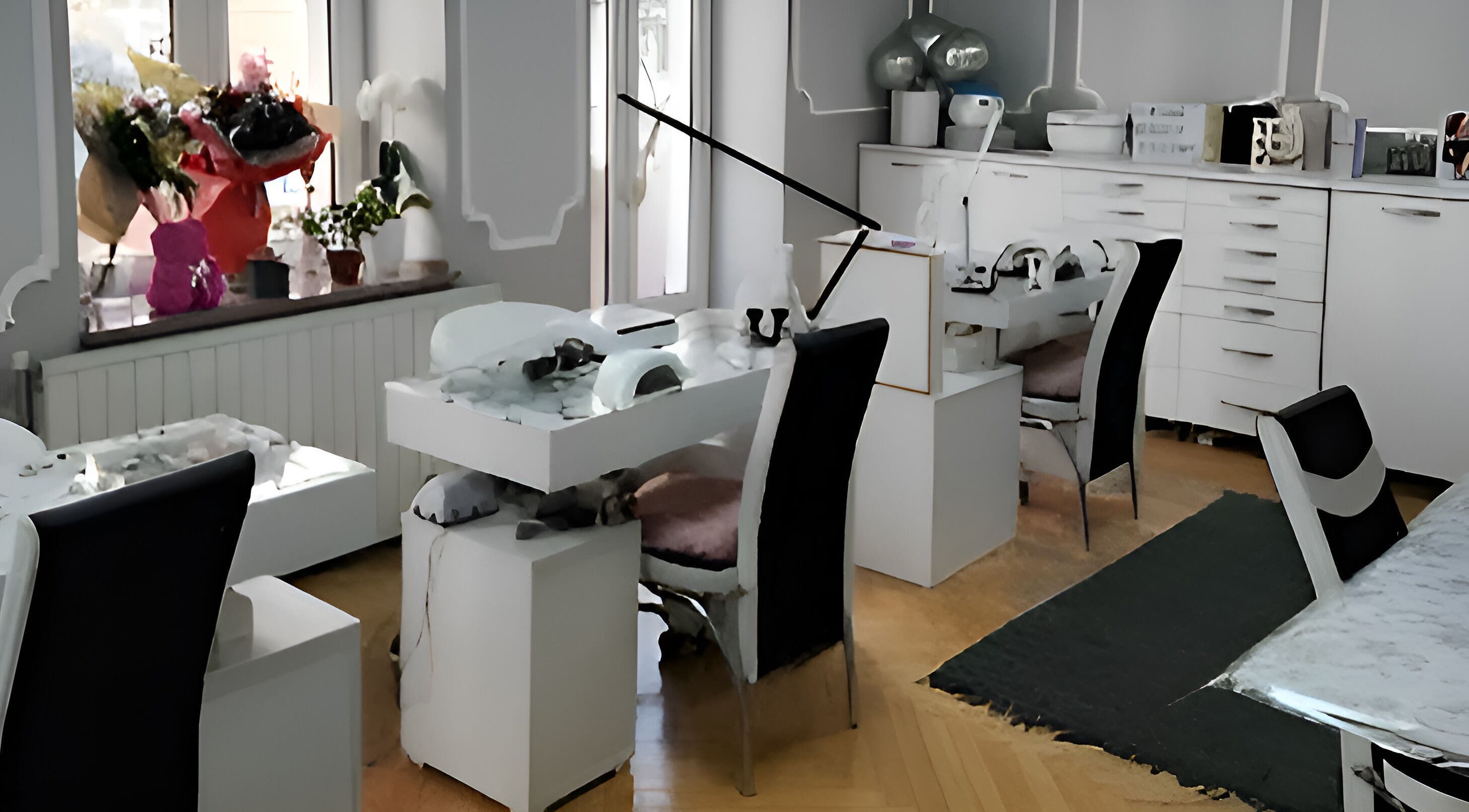 Modern nail studio at Right Beauty, Beograd, RS. Elegant white decor with flowers and stylish seating.