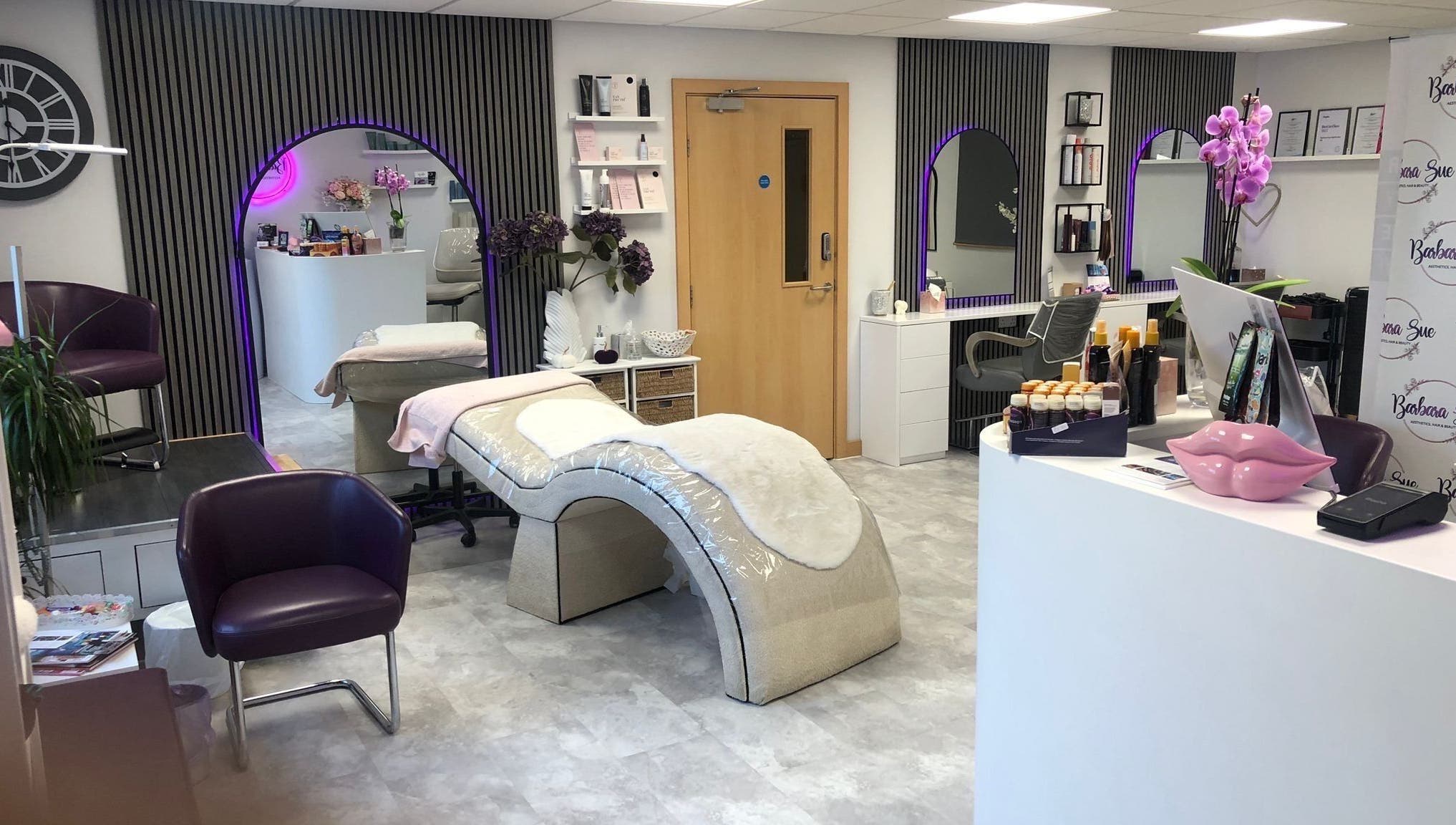 Elegant interior of Barbara Sue Aesthetics Ltd, Felixstowe, England, GB. Modern treatment area with plush decor.