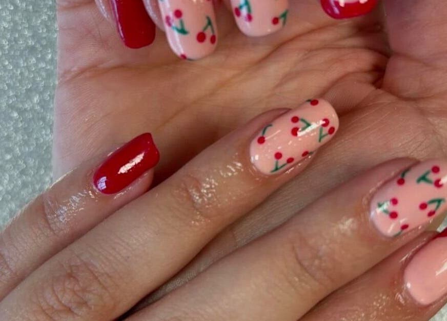 Cherry-themed nails at Barbara Sue Aesthetics Ltd in Felixstowe, England, GB.