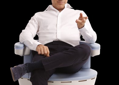 Man sitting on a wellness chair at Current Body Solutions/Concierge Functional Wellness LLC in Houston, Texas, US.
