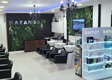 Chic interior of Kazanoo Hair Studio by Adrian in Galway, County Galway, IE with stylish chairs and product displays.