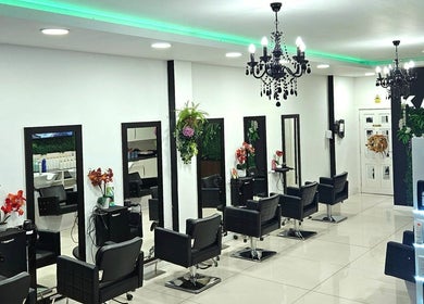 Modern salon interior at Kazanoo Hair By Adrian, Galway, County Galway, IE with chic decor and styling stations.