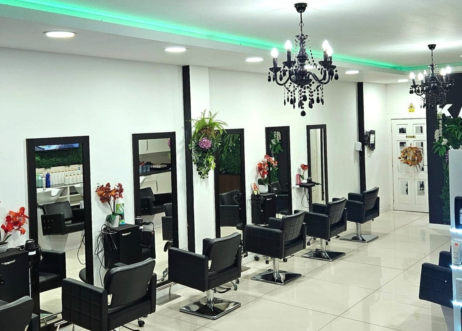 Modern salon interior at Kazanoo Hair By Adrian, Galway, County Galway, IE with chic decor and styling stations.