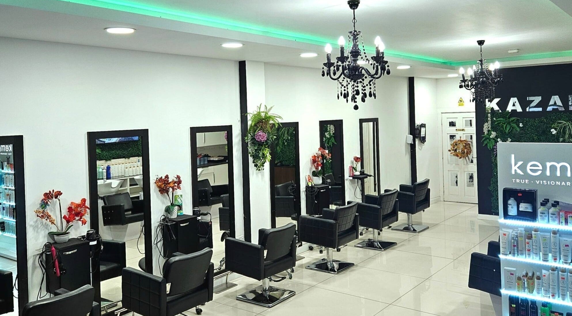 Modern salon interior at Kazanoo Hair By Adrian, Galway, County Galway, IE with chic decor and styling stations.