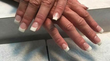 Hand On Nails and Hair image 3