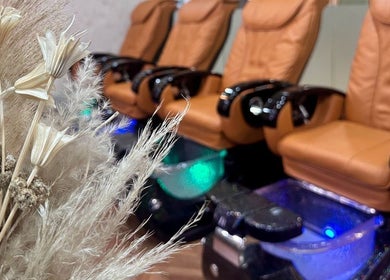 Luxurious pedicure chairs at Julia Beauty at Orchard, Singapore, Singapore, SG with elegant floral decor.