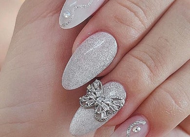 Intricate silver nail art with jewels at Julia Beauty at Orchard, Singapore, Singapore, SG.
