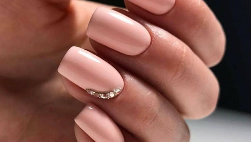 Elegant manicured nails at Ocean Tranquility Mobile Spa, Sandton, Gauteng, ZA, showcasing sleek design.