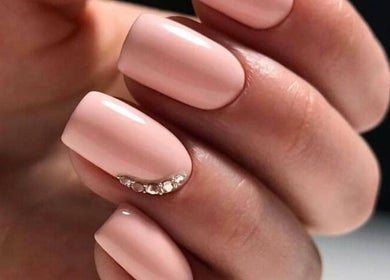 Elegant manicured nails at Ocean Tranquility Mobile Spa, Sandton, Gauteng, ZA, showcasing sleek design.