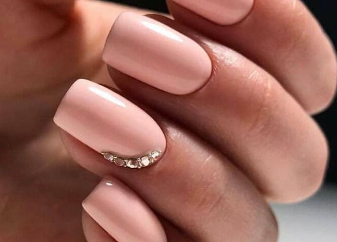 Elegant manicured nails at Ocean Tranquility Mobile Spa, Sandton, Gauteng, ZA, showcasing sleek design.