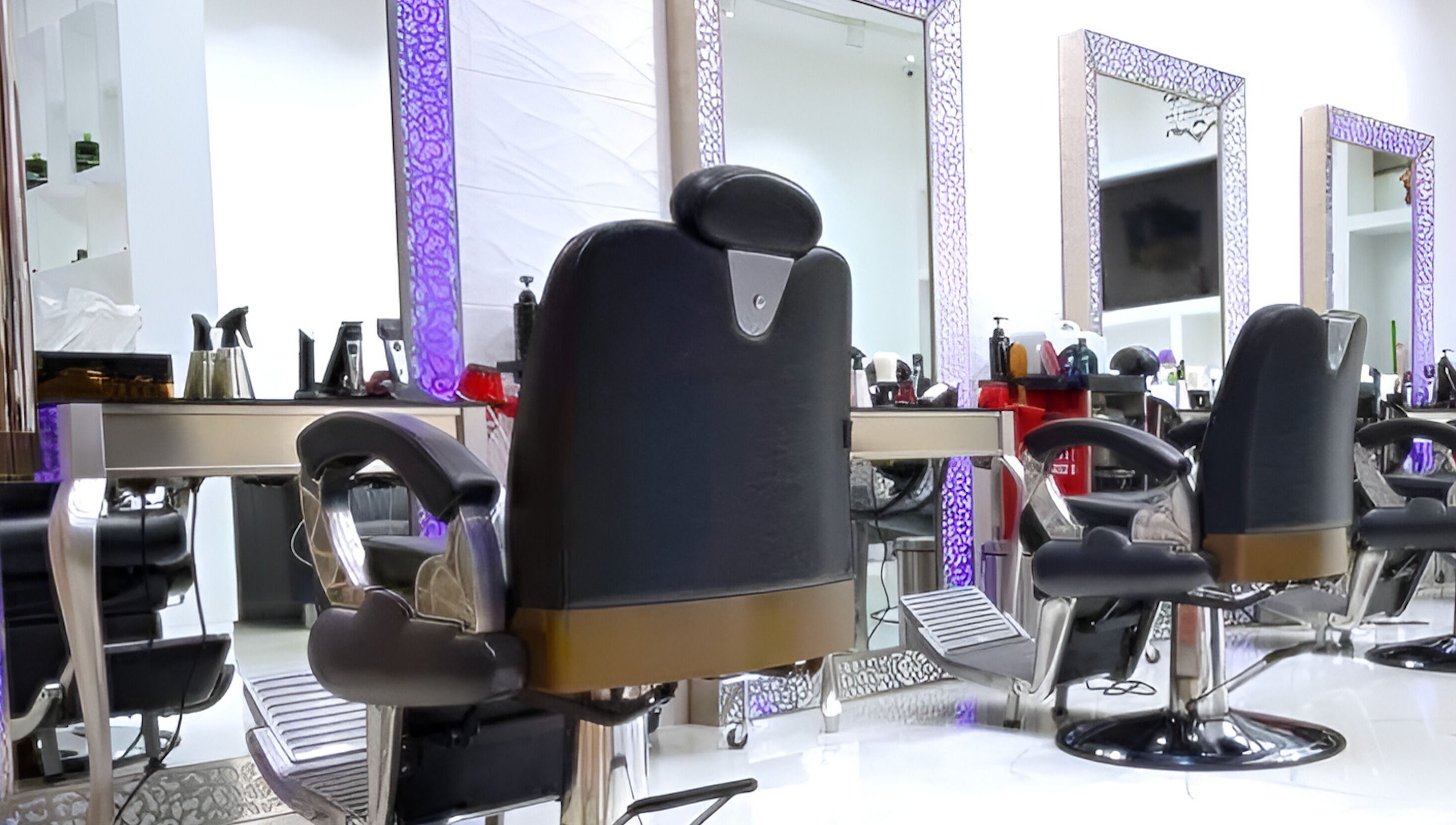 Modern salon chairs and mirrors at Spark Gents Salon, Abu Dhabi, Abu Dhabi, AE, exuding luxury and style.