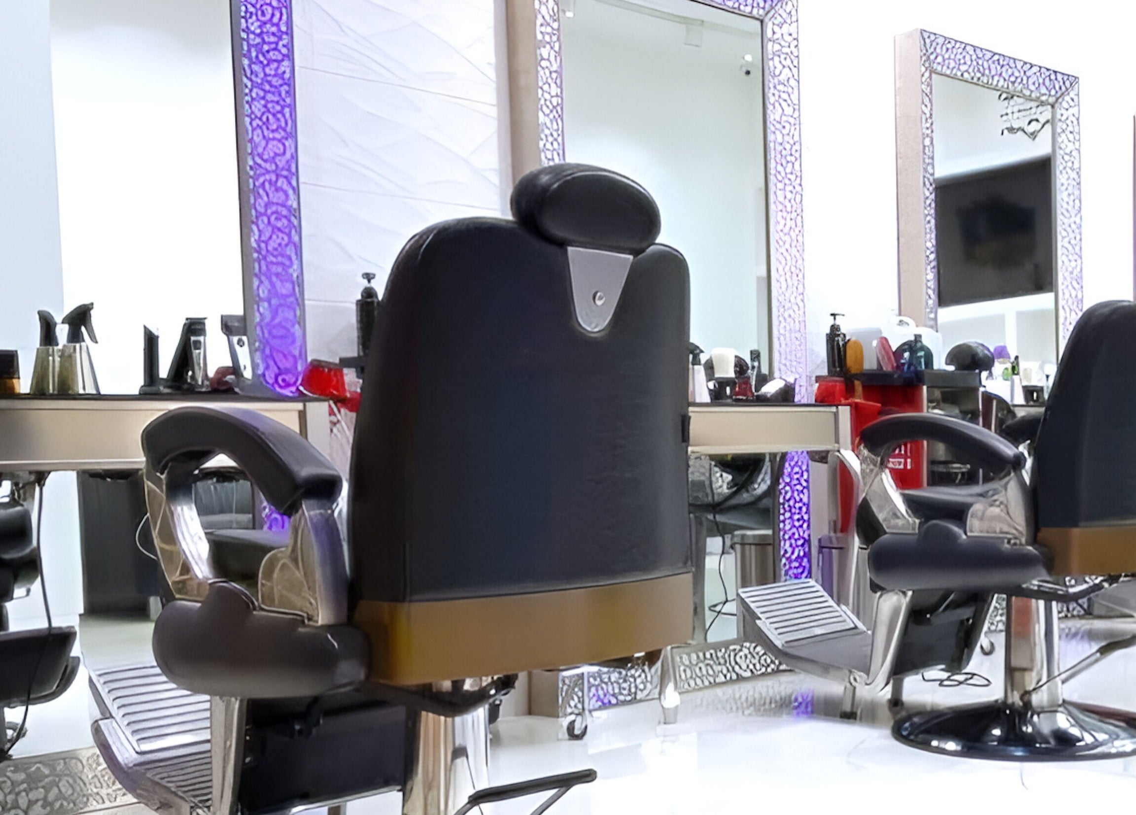 Modern salon chairs and mirrors at Spark Gents Salon, Abu Dhabi, Abu Dhabi, AE, exuding luxury and style.