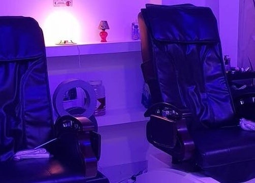 Luxurious massage chairs at Spark Gents Salon, Abu Dhabi, Abu Dhabi, AE, offering unmatched comfort.