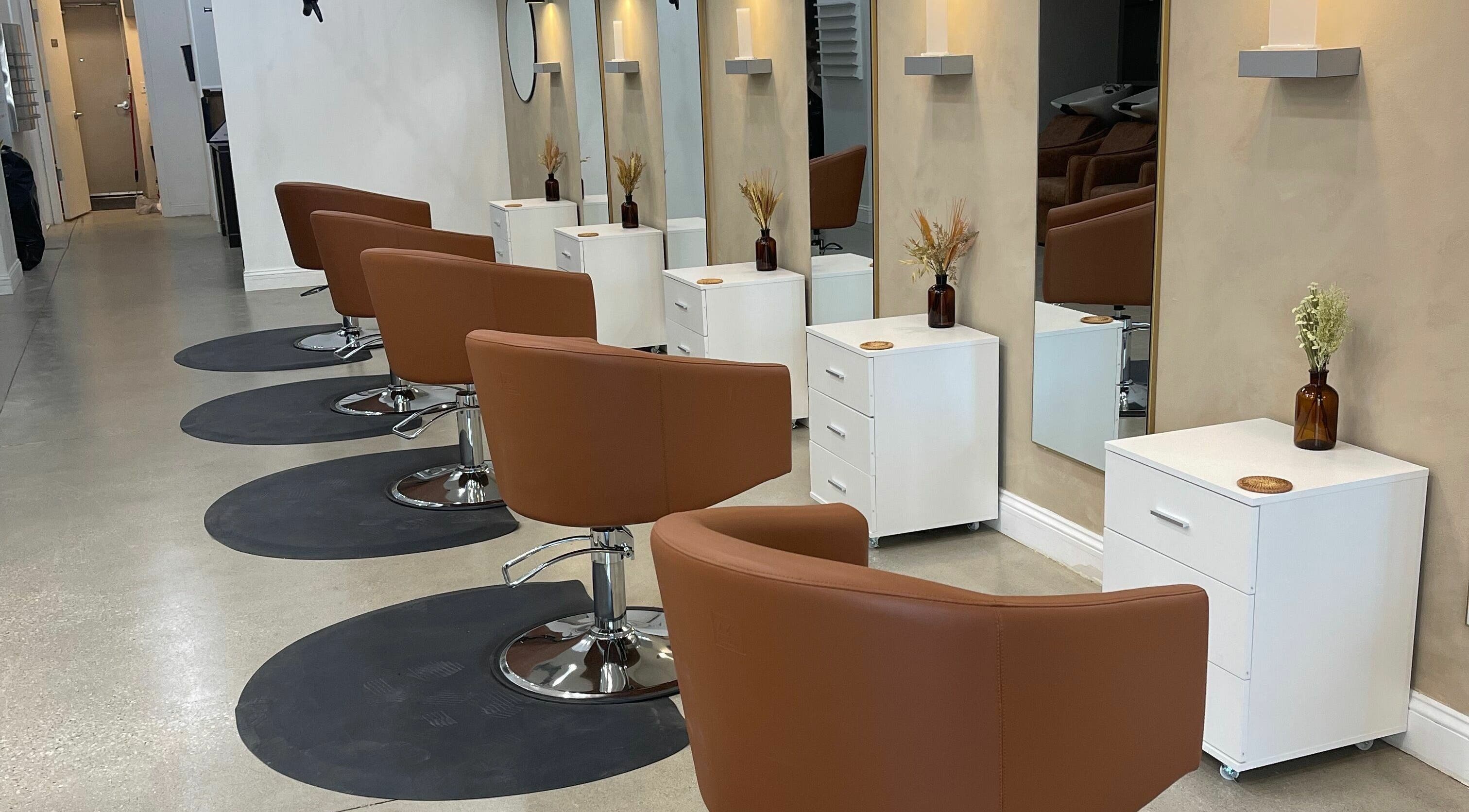 Stylish salon chairs at Betty J Salon in Warrensville Heights, Ohio, US, exuding modern elegance and comfort.