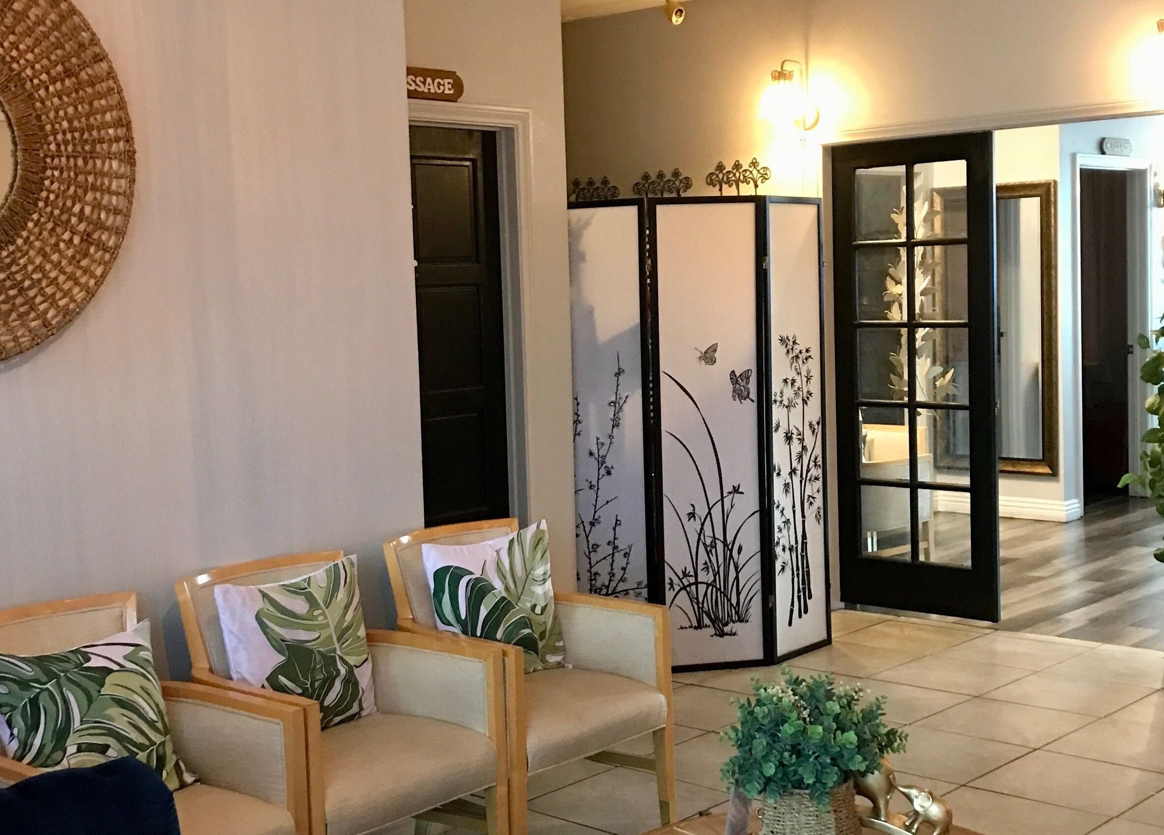 Inviting lobby of LUXE Thai Spa & Massage in Las Vegas, Nevada, US, featuring elegant decor and cozy seating.