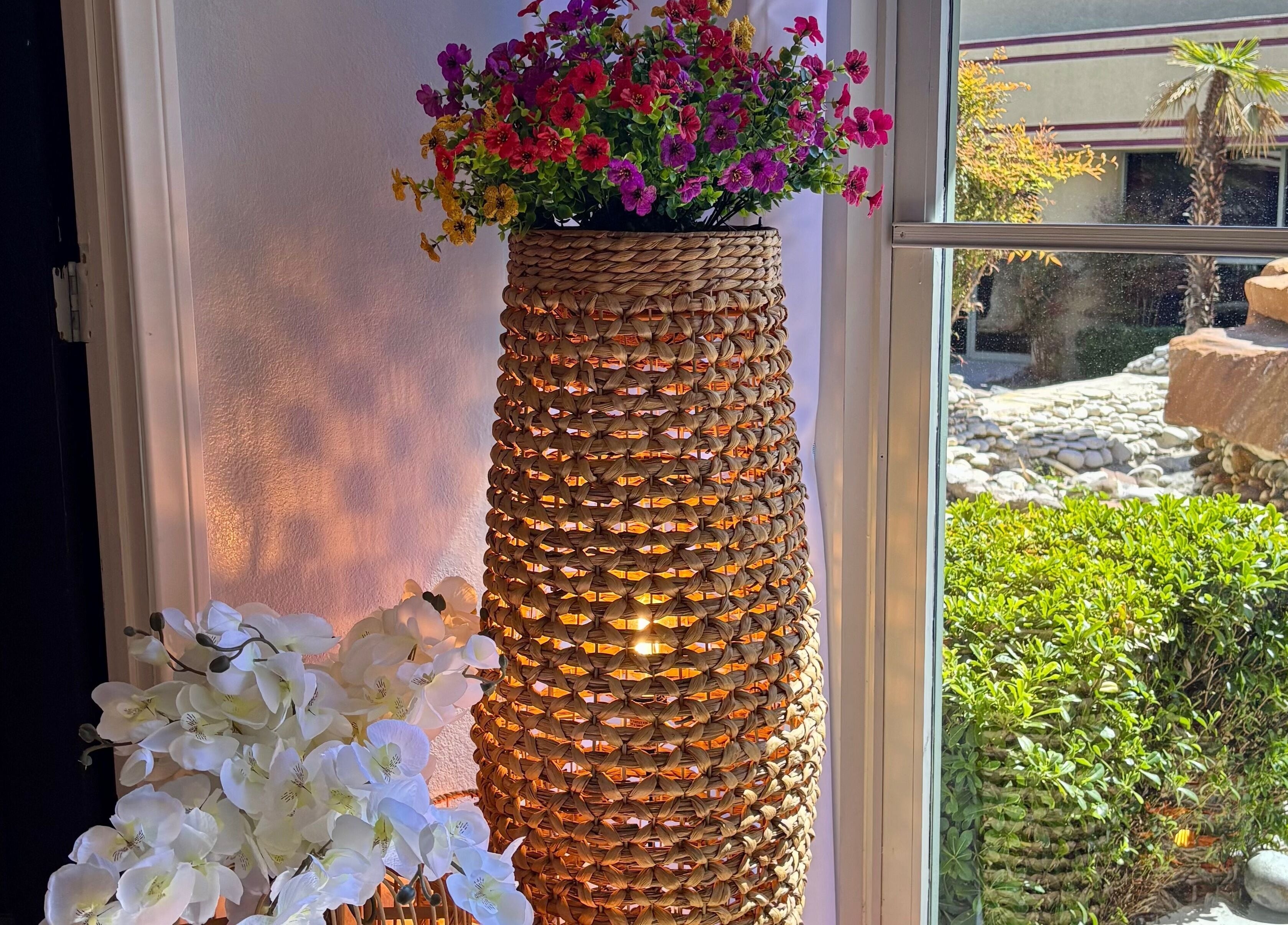 Lush flower arrangement at LUXE Thai Spa & Massage in Las Vegas, Nevada, US with a view of tranquil garden.