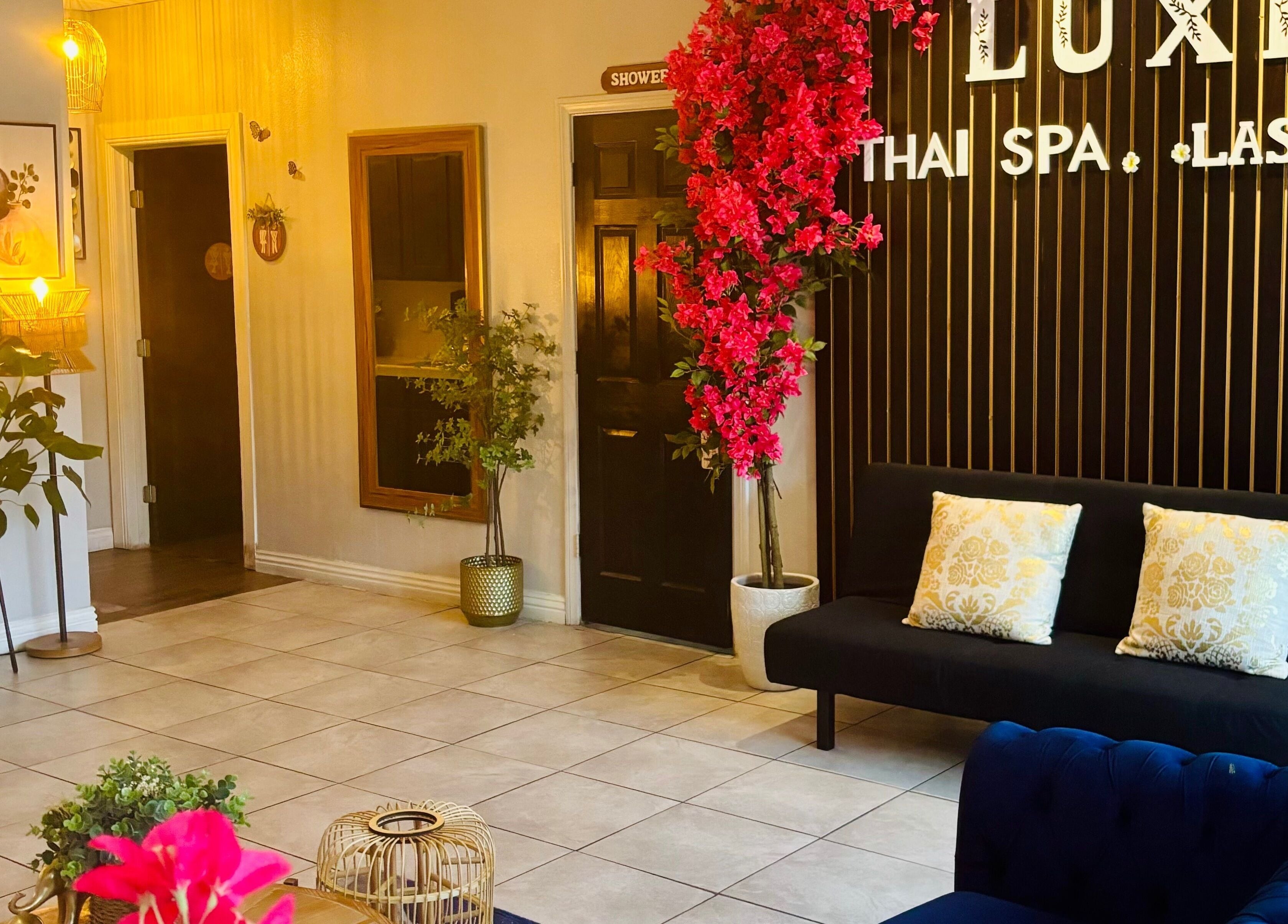 Elegant interior of LUXE Thai Spa & Massage, Las Vegas, Nevada, US with vibrant decor and cozy seating.