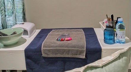 Cozy nail care setup at House of Beauty and Skincare in Grabouw, Western Cape, ZA featuring vibrant polish options.