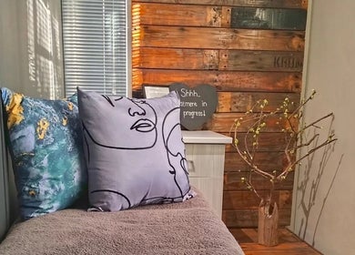 Relaxing spa room with cozy decor at House of Beauty and Skincare, Grabouw, Western Cape, ZA.