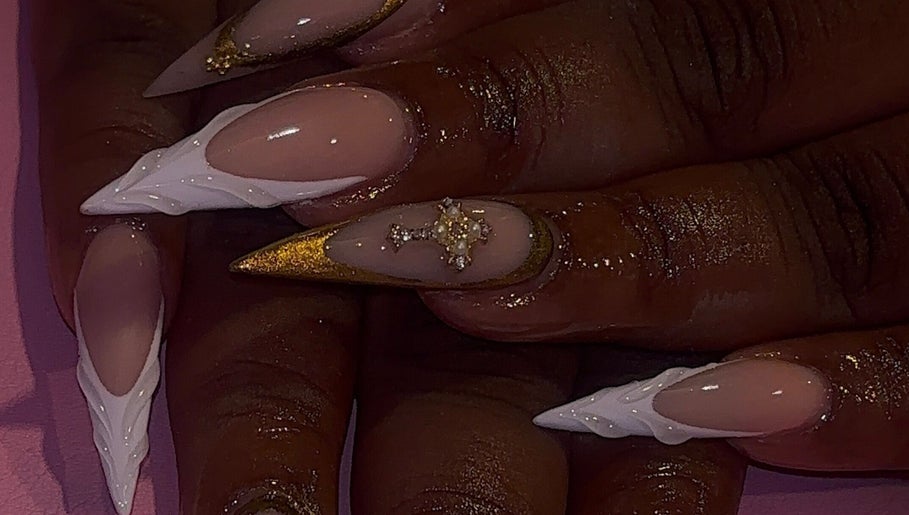 Unique nail art with gold accents at That Girl Collection, Ajax, CA.