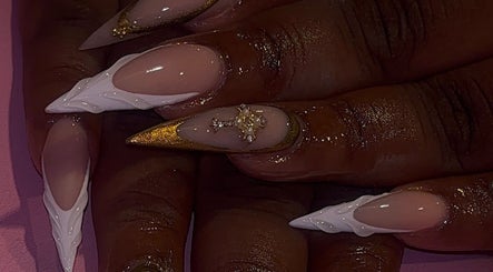 Unique nail art with gold accents at That Girl Collection, Ajax, CA.