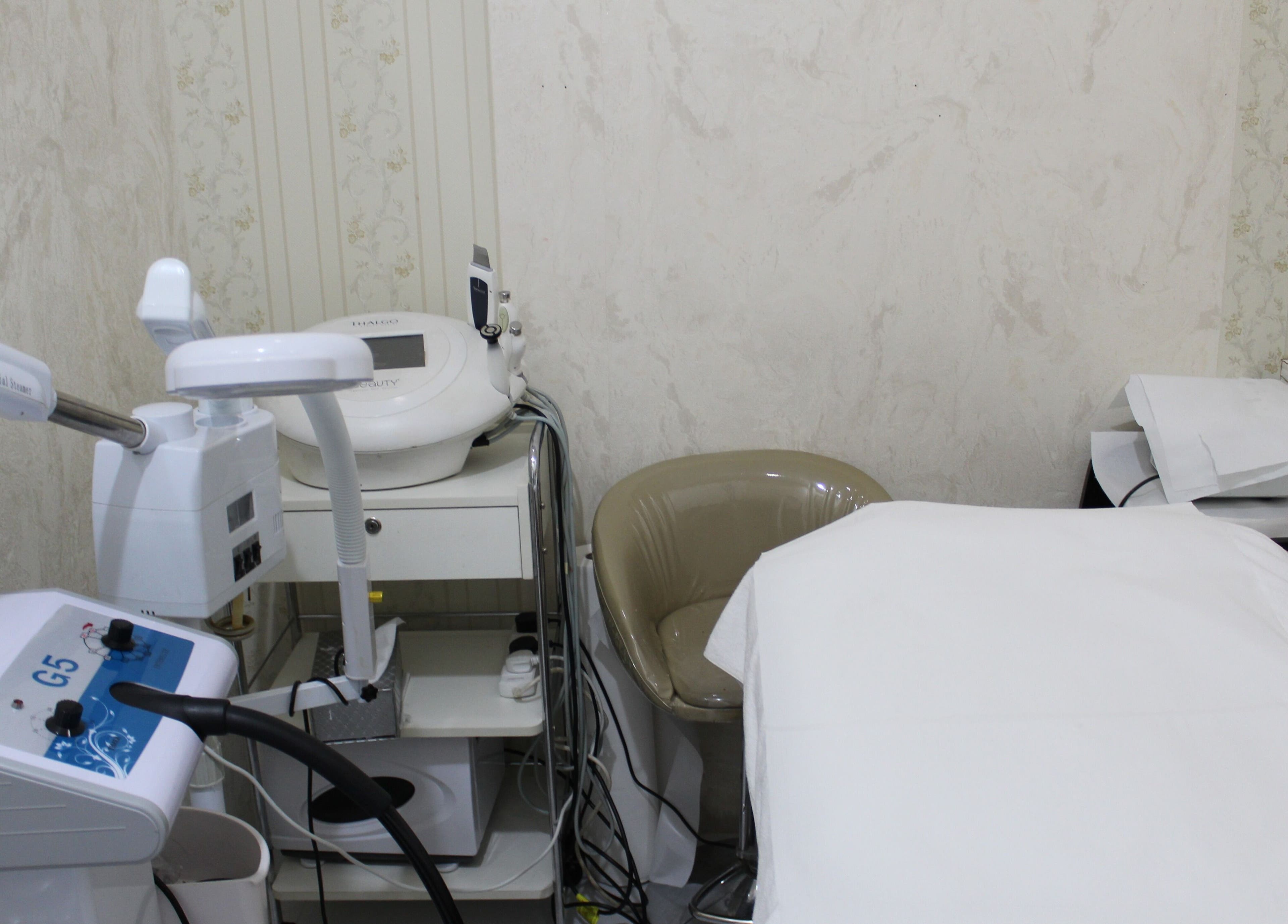 Modern treatment room at Harmony Ladies Salon, Dubai, Dubai, AE with advanced beauty equipment.