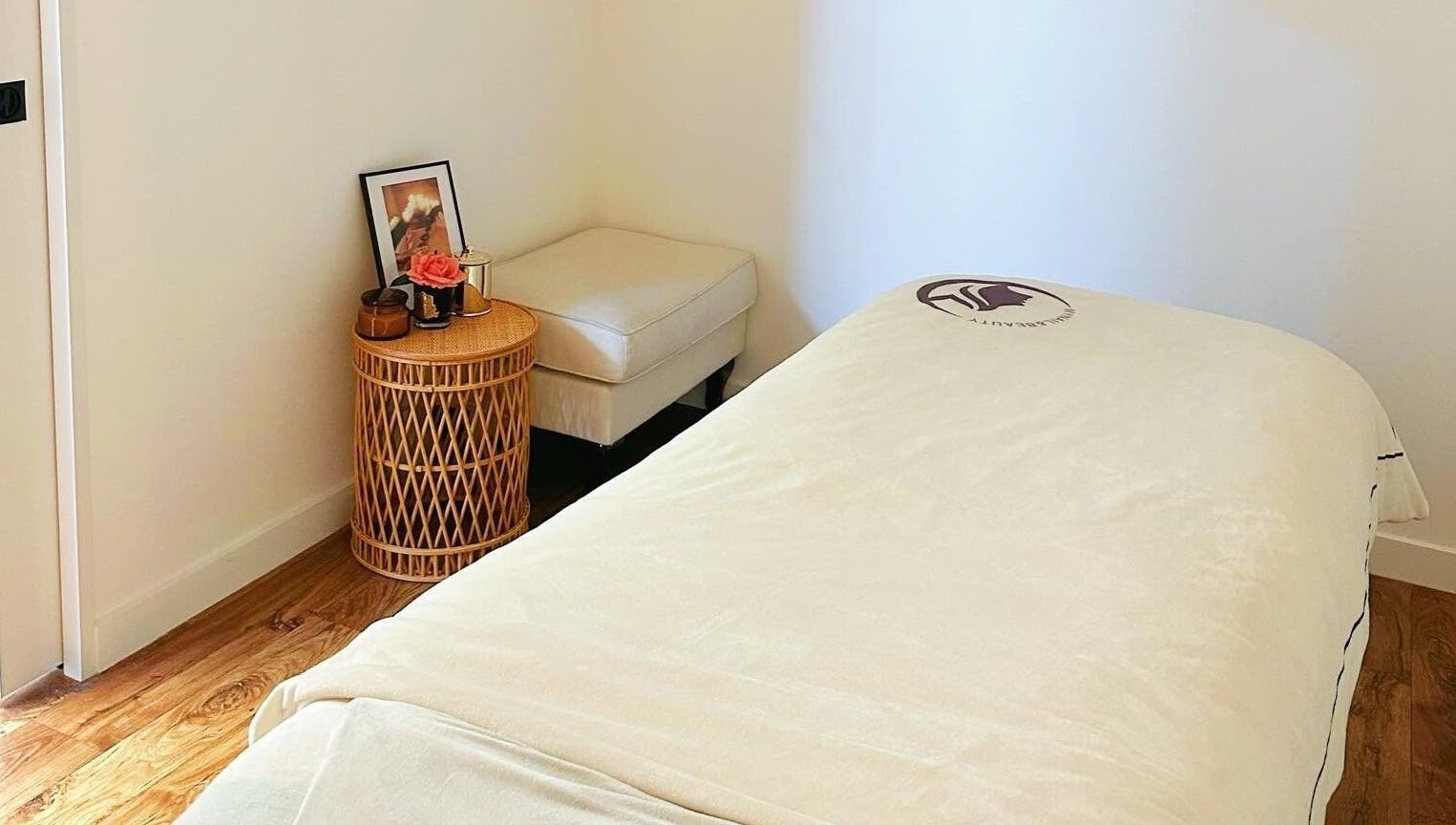 Cozy spa room at My Nail & Beauty in Christchurch, Canterbury, NZ, with plush bed and soothing decor.