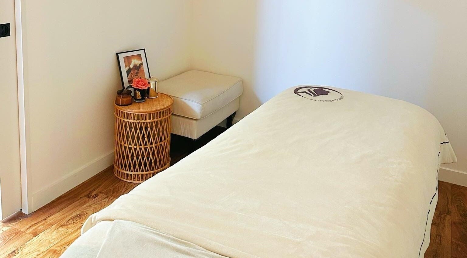 Cozy spa room at My Nail & Beauty in Christchurch, Canterbury, NZ, with plush bed and soothing decor.