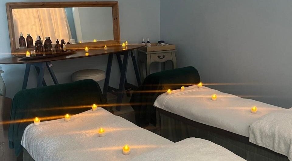 Relaxing spa room at 177Bikini Beach, Gordon's Bay, Cape Town, Western Cape, ZA, with candles and massage beds.