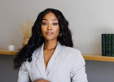 A welcoming professional at Touch by Thato Fourways, Sandton, Gauteng, ZA, showcasing modern beauty services.