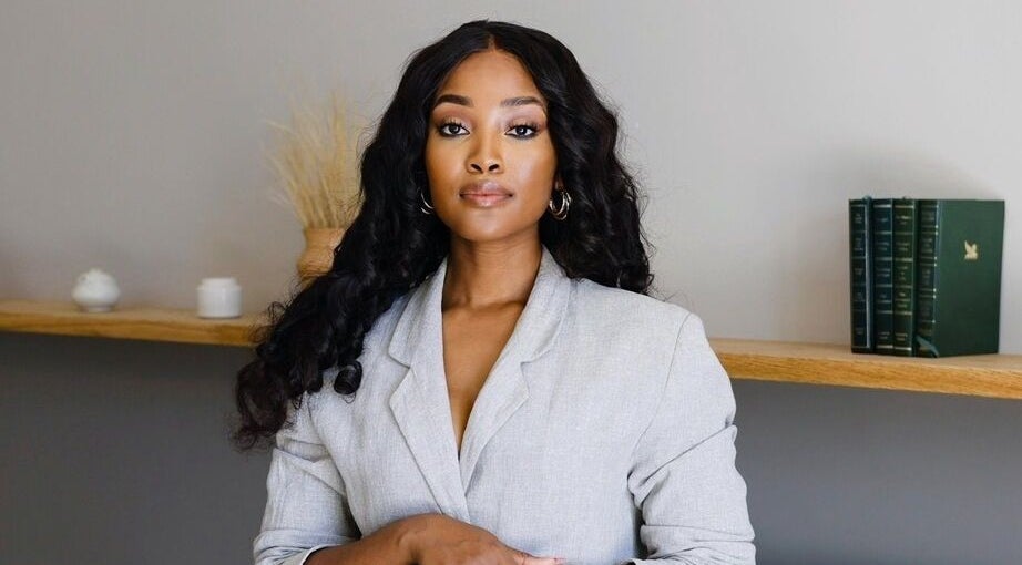 Professional woman in elegant setting at Touch by Thato Fourways, Sandton, Gauteng, ZA.