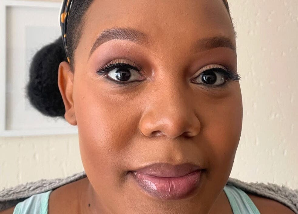 A customer with flawless makeup at Touch by Thato Pretoria, located in Pretoria, Gauteng, ZA.