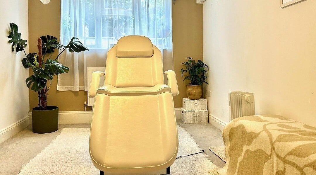 Comfortable therapy chair in serene Kao Beauty, London, London, GB, featuring a calming interior design.