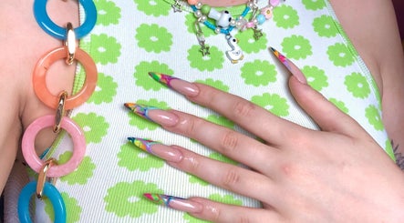 Colorful nail art at Jade Saunders Nails, Rugby, England, GB, featuring vibrant floral and geometric designs.