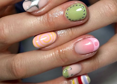 Stylish nail art at Jade Saunders Nails, Rugby, England, GB, showcasing intricate designs and vibrant colors.