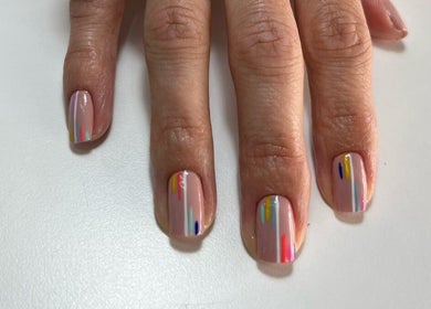 Colorful nail art at Black and Purple Pride of Royalty at Hair Design Salon, Roodepoort, Gauteng, ZA.