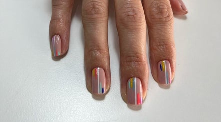 Colorful nail art at Black and Purple Pride of Royalty at Hair Design Salon, Roodepoort, Gauteng, ZA.