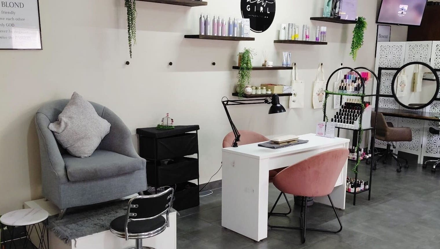 Stylish interior of Black & Purple Beauty Spa - Nails By Dee in Roodepoort, Gauteng, ZA, featuring manicure station.