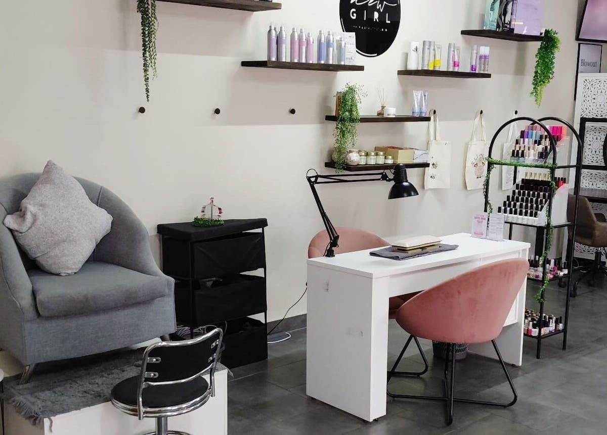 Stylish interior of Black & Purple Beauty Spa - Nails By Dee in Roodepoort, Gauteng, ZA, featuring manicure station.
